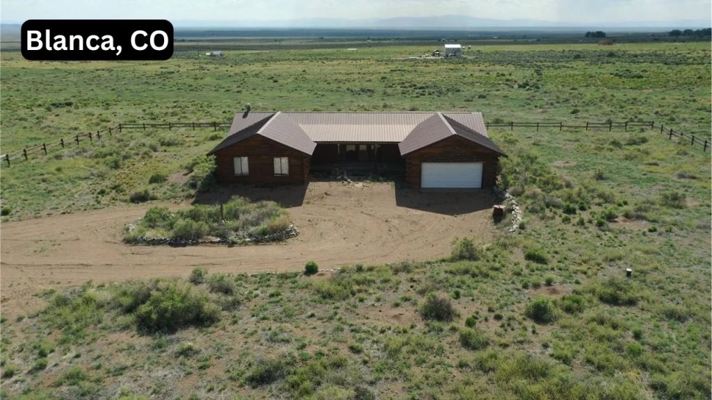 A rustic contemporary 3-bedroom, 2-bathroom home on 9.71 acres in Blanca, CO, featuring 2,024 sq ft of living space and surrounded by open countryside.