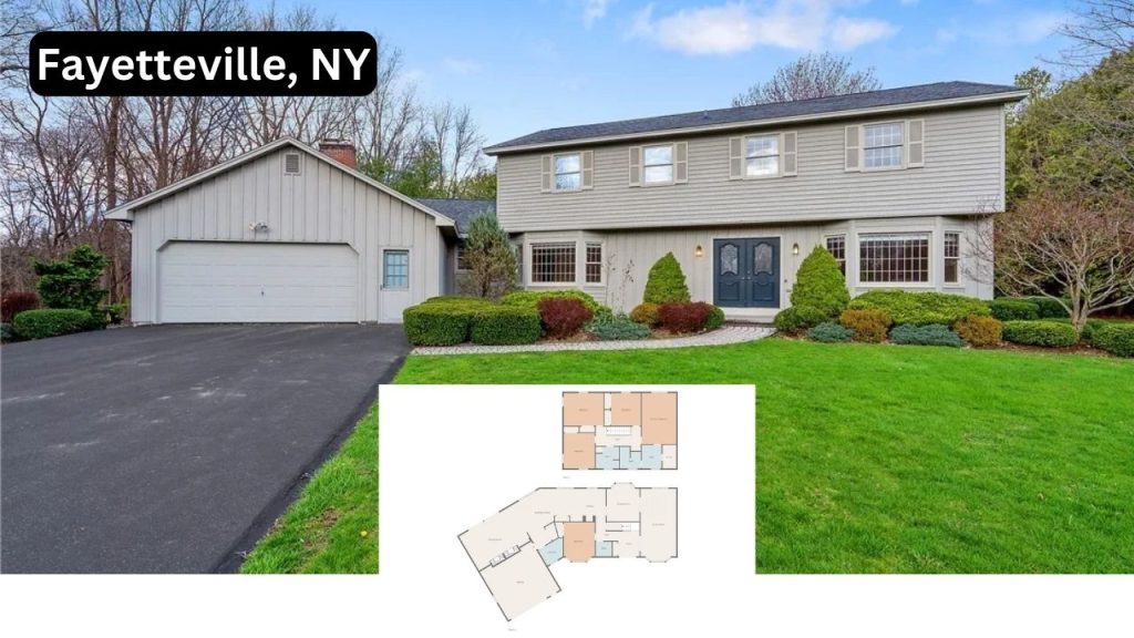 A two-story Colonial house in Fayetteville, NY, with a garage, landscaped yard, and floor plan.