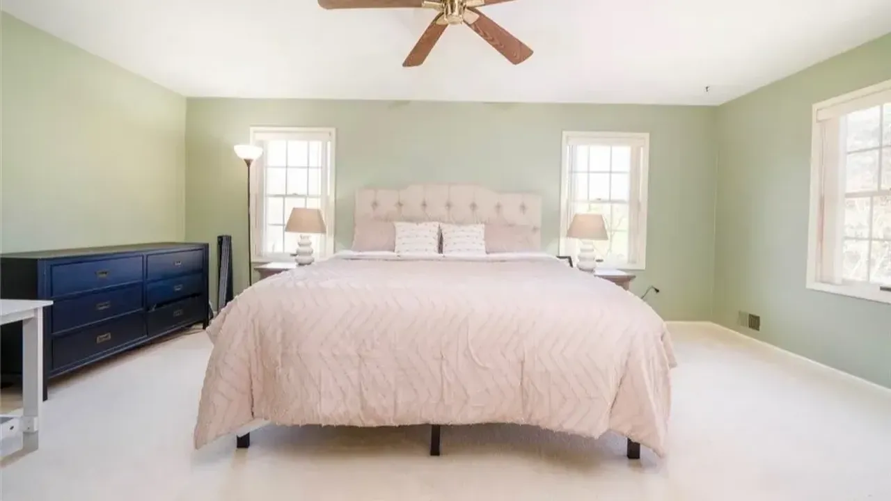 Discover this 1993 Contemporary Colonial With First Floor Office in Rochester, NY. (Floor Plan Inside)