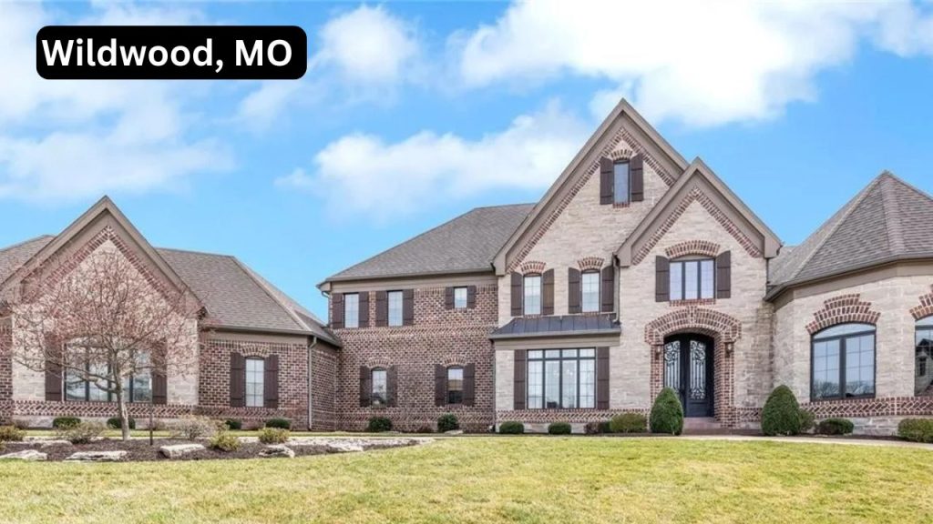 Elegant brick and stone estate in Wildwood, MO, featuring spacious interiors and stunning design.