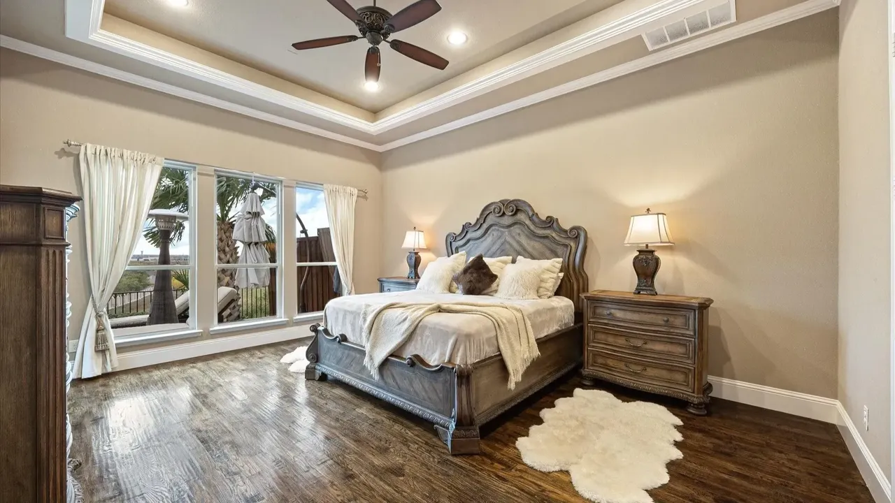 Explore This Elegant Mediterranean Retreat With Soaring Ceilings, Marble Floors, and Poolside Paradise (Floor Plan Inside)