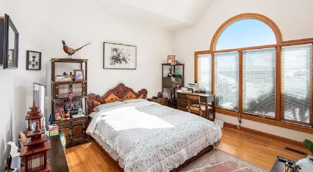 Elegant 6,173 Sq-Ft 4-Bedroom Split-Level with Island Kitchen and Finished Basement in Prestigious West Ridge (With Floor Plan)