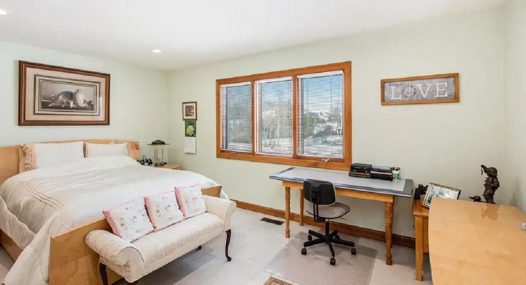 Elegant 6,173 Sq-Ft 4-Bedroom Split-Level with Island Kitchen and Finished Basement in Prestigious West Ridge (With Floor Plan)