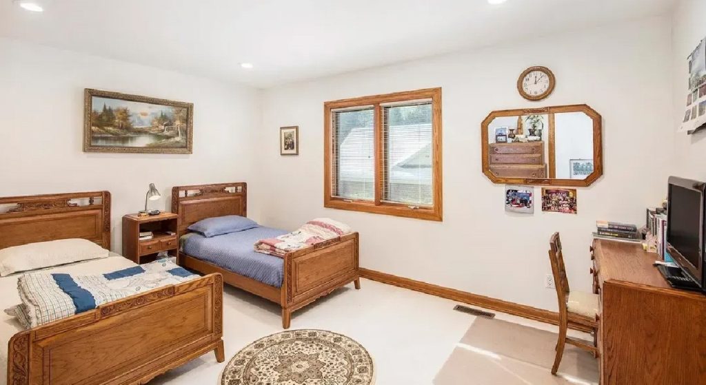 Elegant 6,173 Sq-Ft 4-Bedroom Split-Level with Island Kitchen and Finished Basement in Prestigious West Ridge (With Floor Plan)