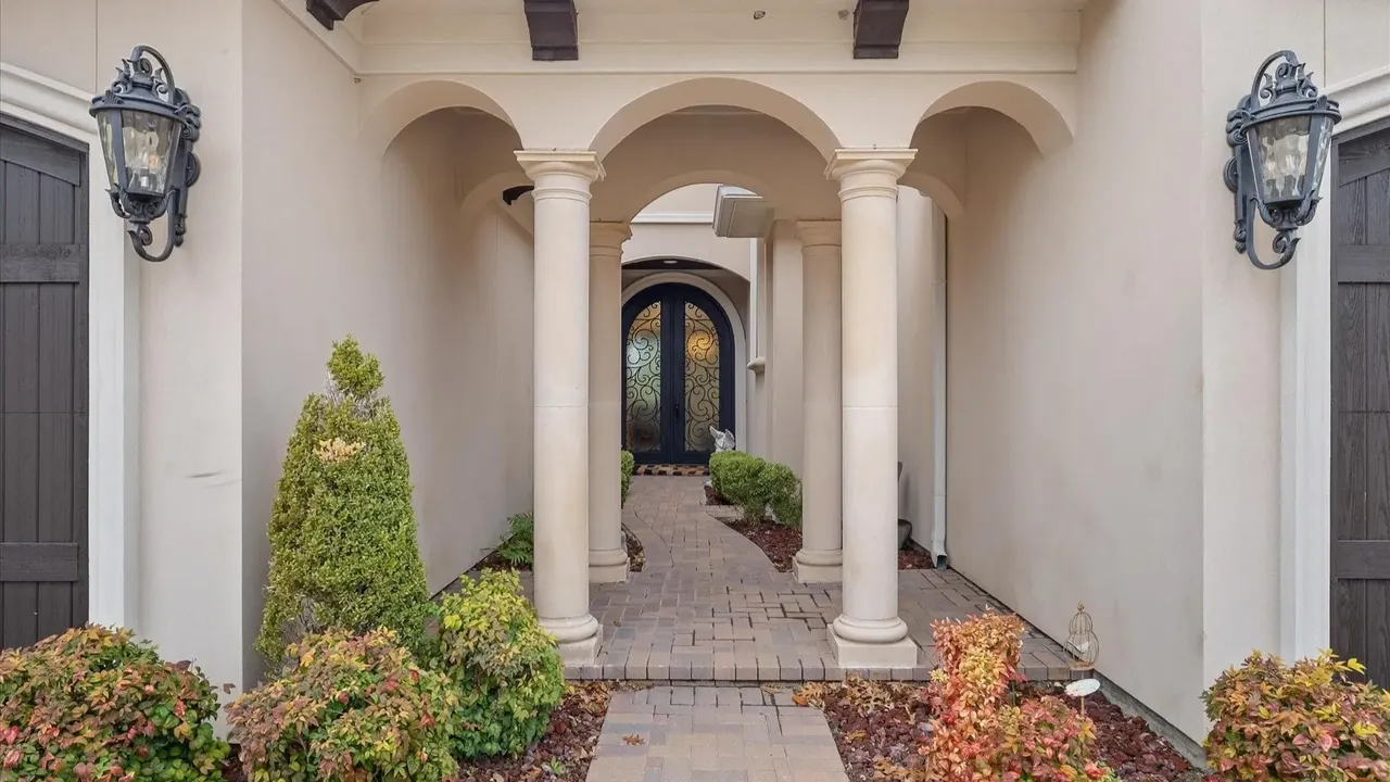 Explore This Elegant Mediterranean Retreat With Soaring Ceilings, Marble Floors, and Poolside Paradise (Floor Plan Inside)
