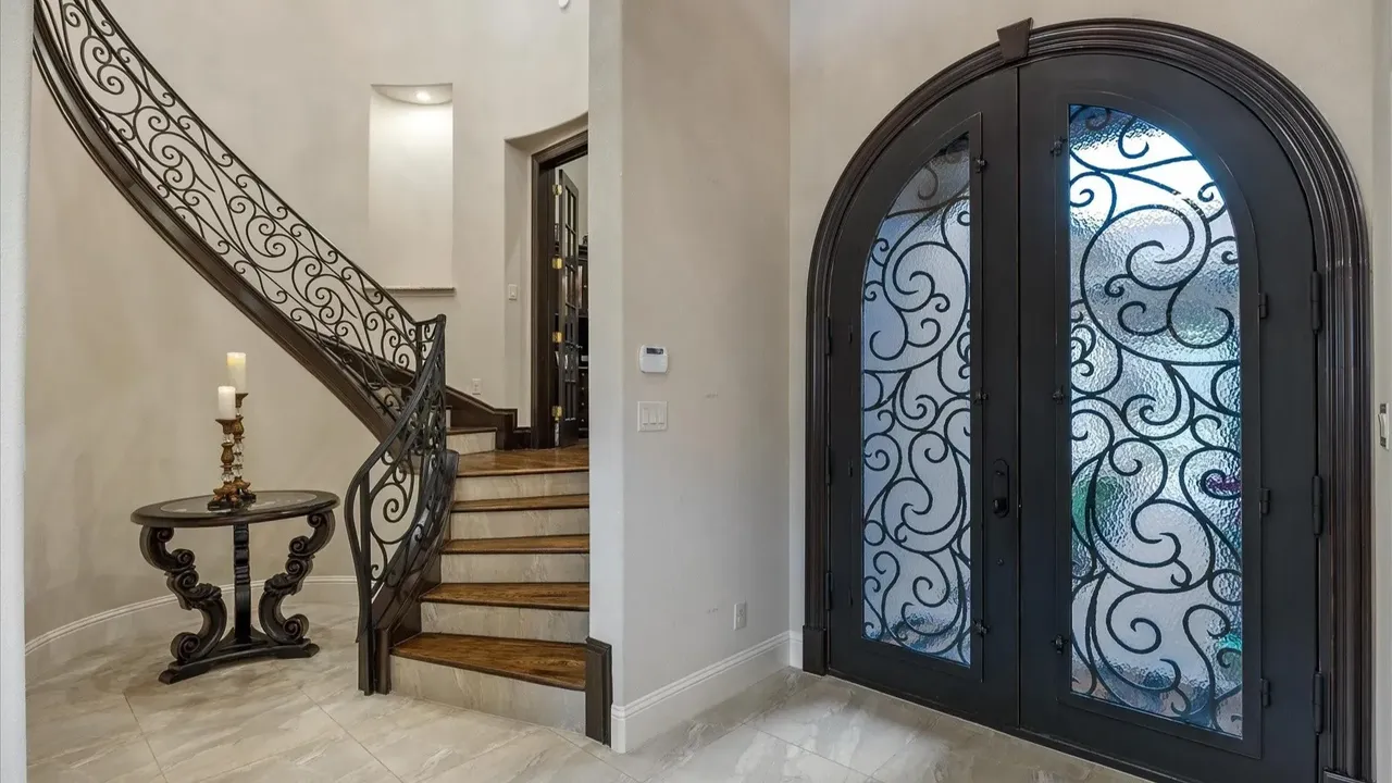 Explore This Elegant Mediterranean Retreat With Soaring Ceilings, Marble Floors, and Poolside Paradise (Floor Plan Inside)