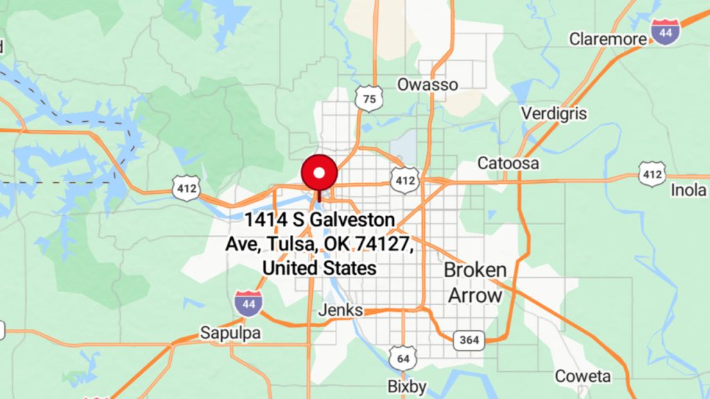 A Rare 1928 Tudor Mansion in Tulsa with Historic Charm, Soaring Ceilings, and 3 Acres of Lush Landscaping and Scenic Views