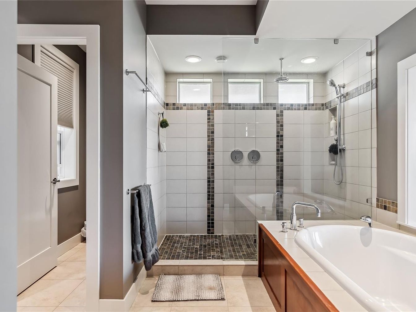 Modern bathroom with walk-in shower and bathtub