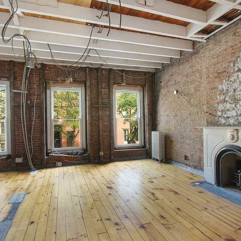 Brick Interior in Daniel Craig and Rachel Weisz’s NYC Home